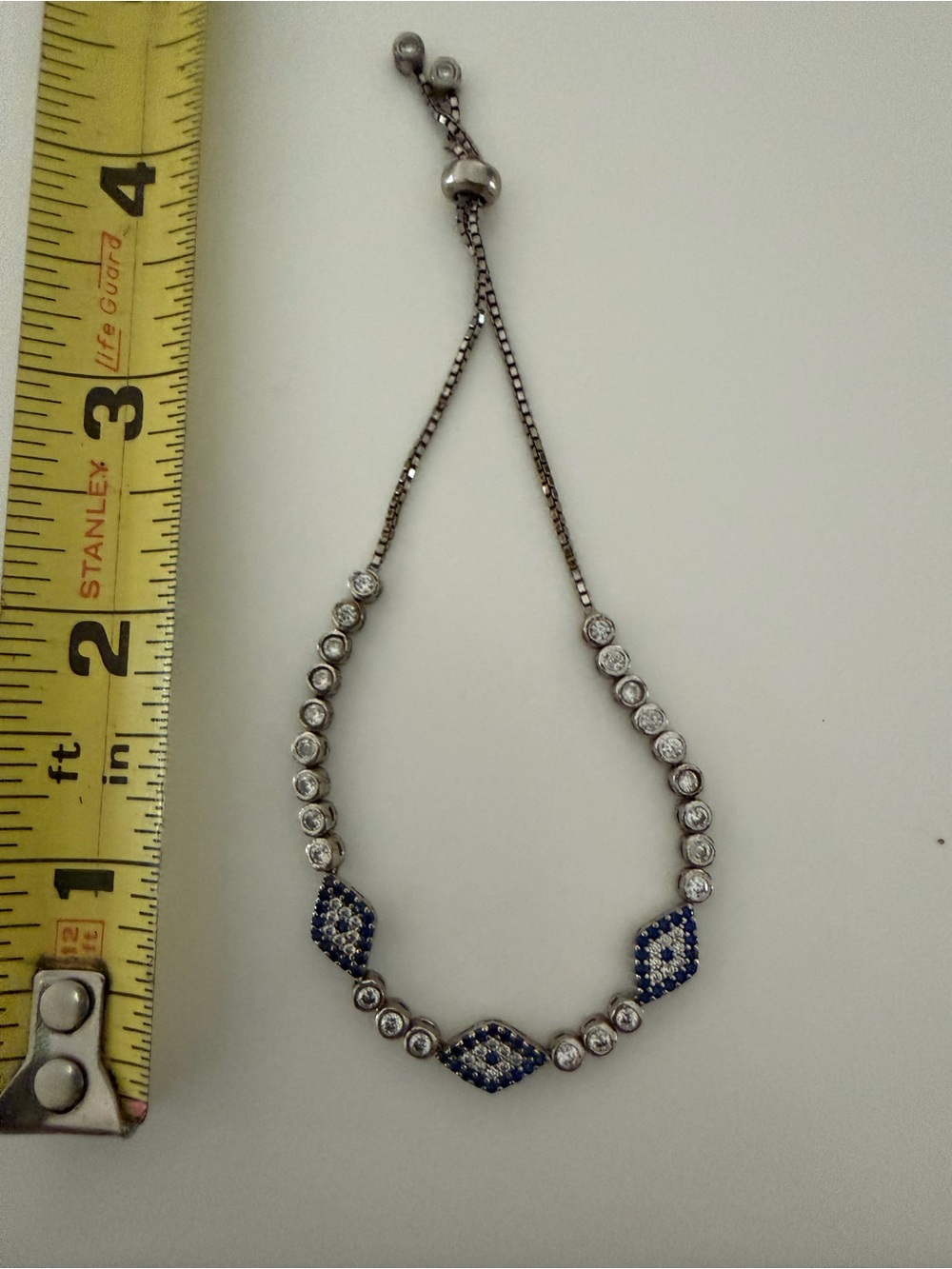 Sterling Silver Adjustable Tennis Bracelet with Blue and White Crystal Accents
